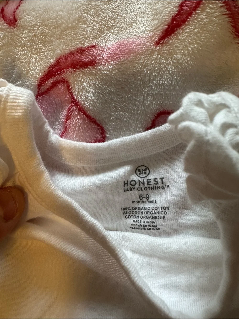The Honest Company White Ruffle Strap Baby One-Piece Bodysuit